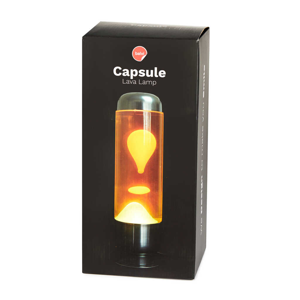 Lampada Lava Capsule: la confezione nera con la lampada accesa gialla in foto.