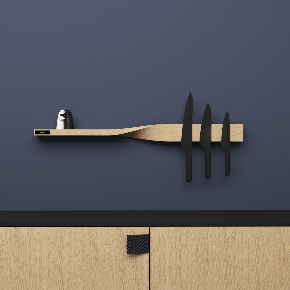 Oak shelf that twists into a magnetic knife rack, on a blue wall