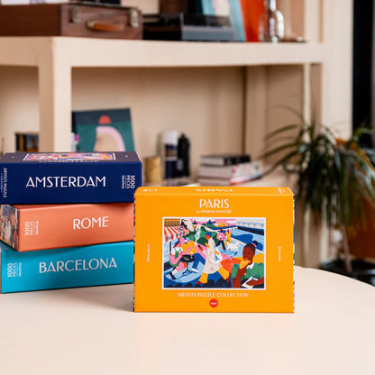 Paris Puzzle box standing on a shelf above the Amsterdam, Rome and Barcelona puzzle boxes.