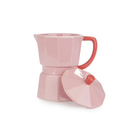 Pink Moka Mug on a white background with the lid resting beside it