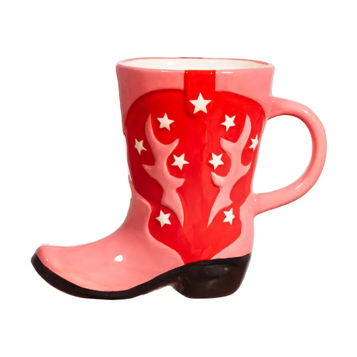 Tazza Rodeo: a cowboy-boot-shaped mug in pink with red stars and a side handle.