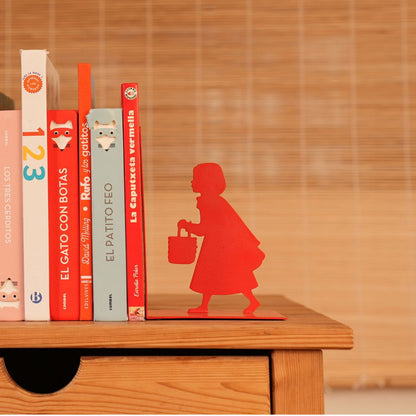 Little Red Bookend: the red silhouette of Little Red Riding Hood holding up the books.