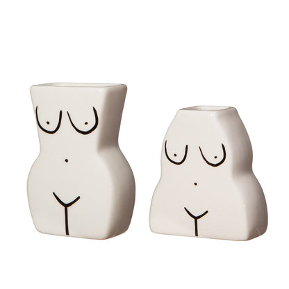 Body Duo vases in white, same design, seen from a slightly different angle.
