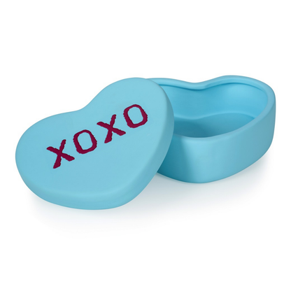 XOXO heart box in light blue, open on a white background, empty inside.