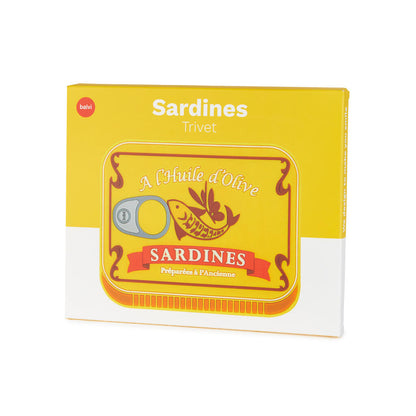 Sardines Trivet: the yellow packaging box printed with a fish and the word Sardines.