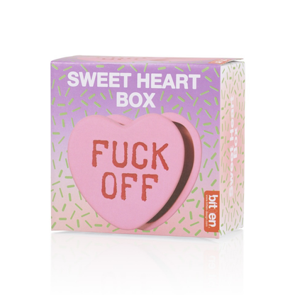 Fuck Off heart box in pink, in its candy-heart shaped packaging.