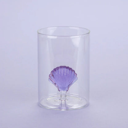 Atlantis Shell glass, empty and clear, with a lilac shell at the base