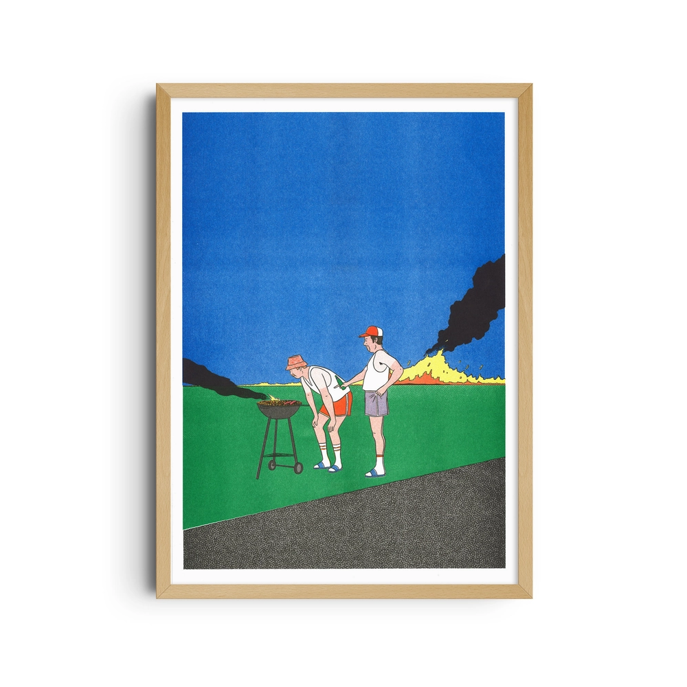 Framed poster of two men at a barbecue with a fire blazing in the background