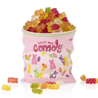Candy vase shaped like a pink bag, filled with colourful gummy bears.