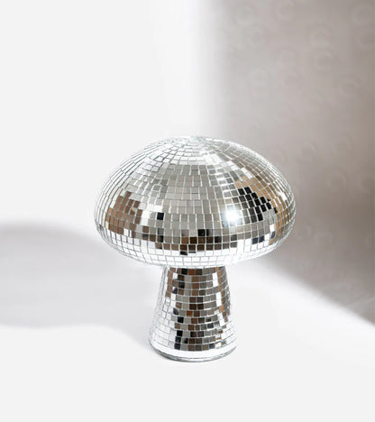 Disco mushroom lamp with mirror tiles on a white background, front view