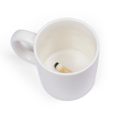 Cigarette Butt mug white mug seen from above with a fake cigarette butt inside.