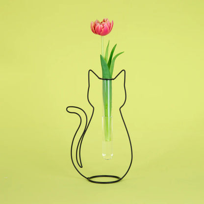Cat Silhouette vase with a pink tulip, on an acid-green background