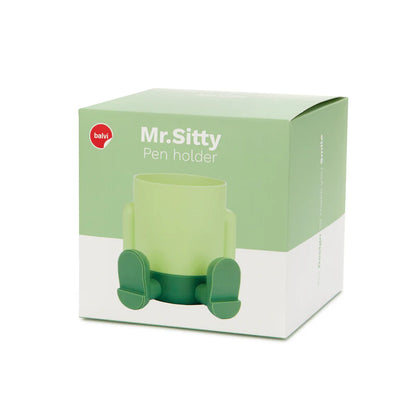 Mr.Sitty pen holder packaging showing the green pot with legs printed on the box.