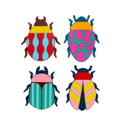 Beetle coasters: four beetle-shaped coasters, each with a different colourful pattern.