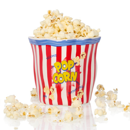 Pop Corn container vase in red and white stripes, filled with popcorn.