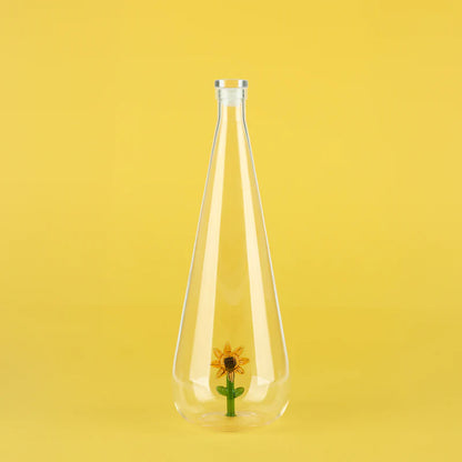 Botanical Sunflower 1L bottle empty on a yellow background with the flower visible at the base