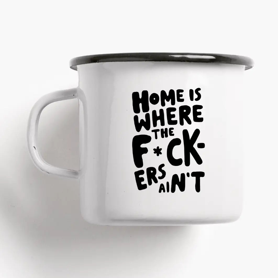 Tazza Home Is Where: a white mug with the hand-lettered words 'HOME IS WHERE THE F*CK-ERS AIN'T'.