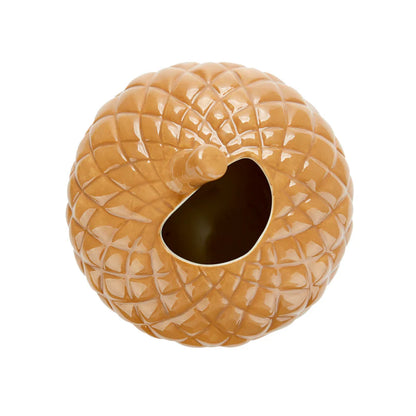 Acorn vase in beige seen from above, showing the round opening in the lid.
