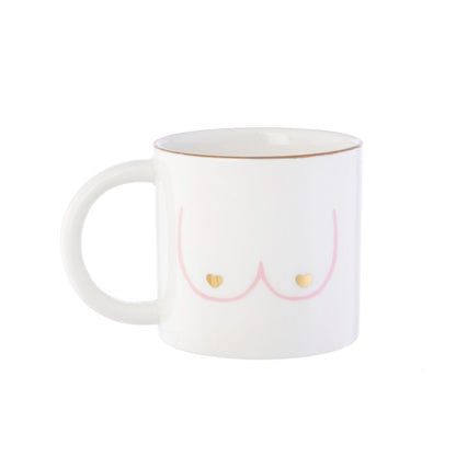 Girl Power mug in white with a pink outline of a bust and two small gold hearts, front view.