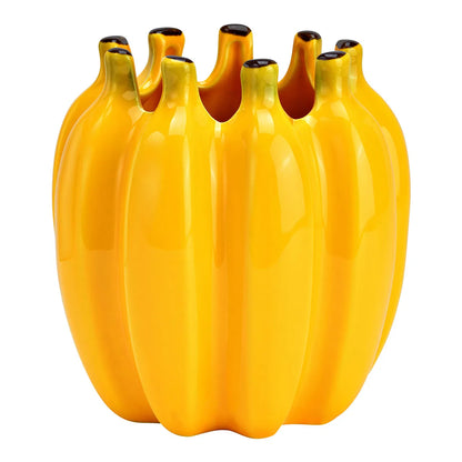 Bananas vase in yellow, formed by clustered bananas making up the container, empty.