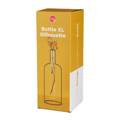 The XL bottle silhouette vase shown in its yellow box