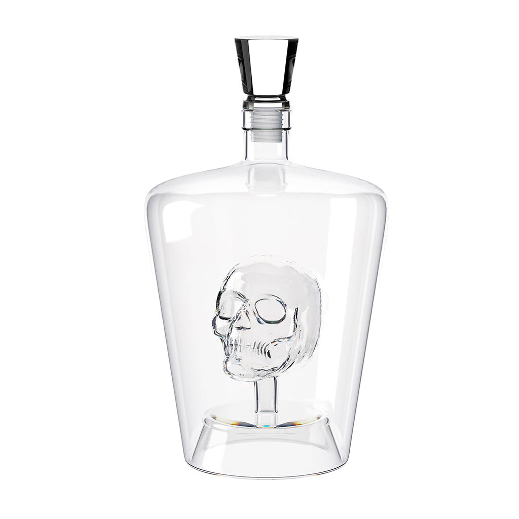 Poison Bottle: the empty decanter with the skull inside and the stopper set aside.