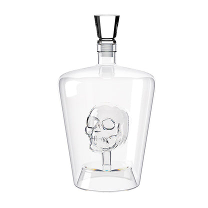 Poison Bottle: the empty decanter with the skull inside and the stopper set aside.