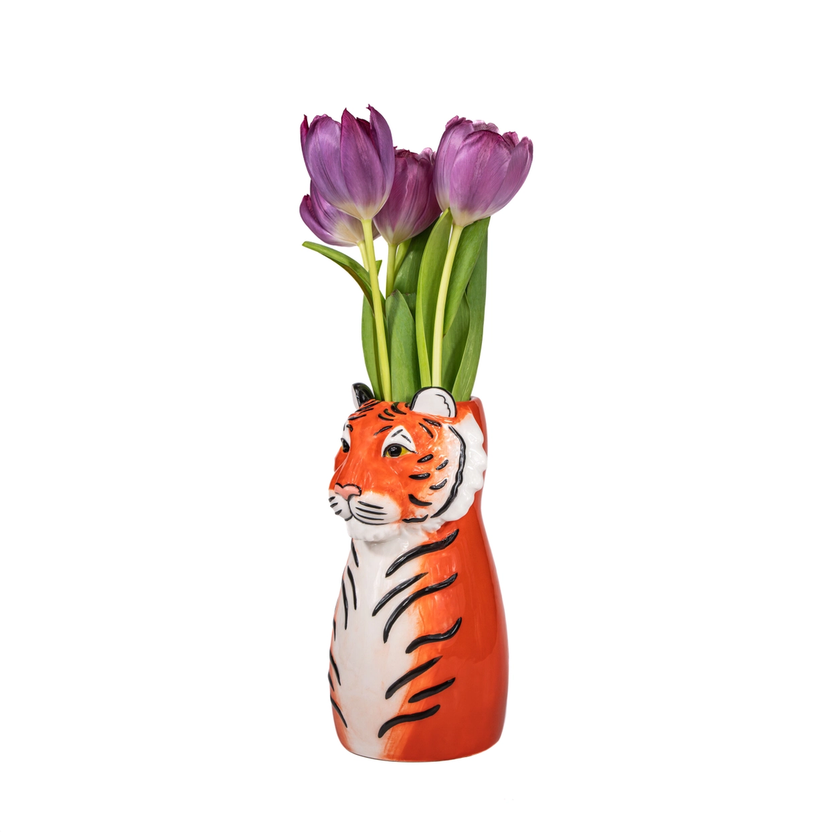 The tiger vase holding purple tulips where the animal's head opens