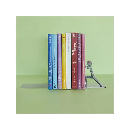 Push! bookend with the figure pushing a row of colourful books, green background