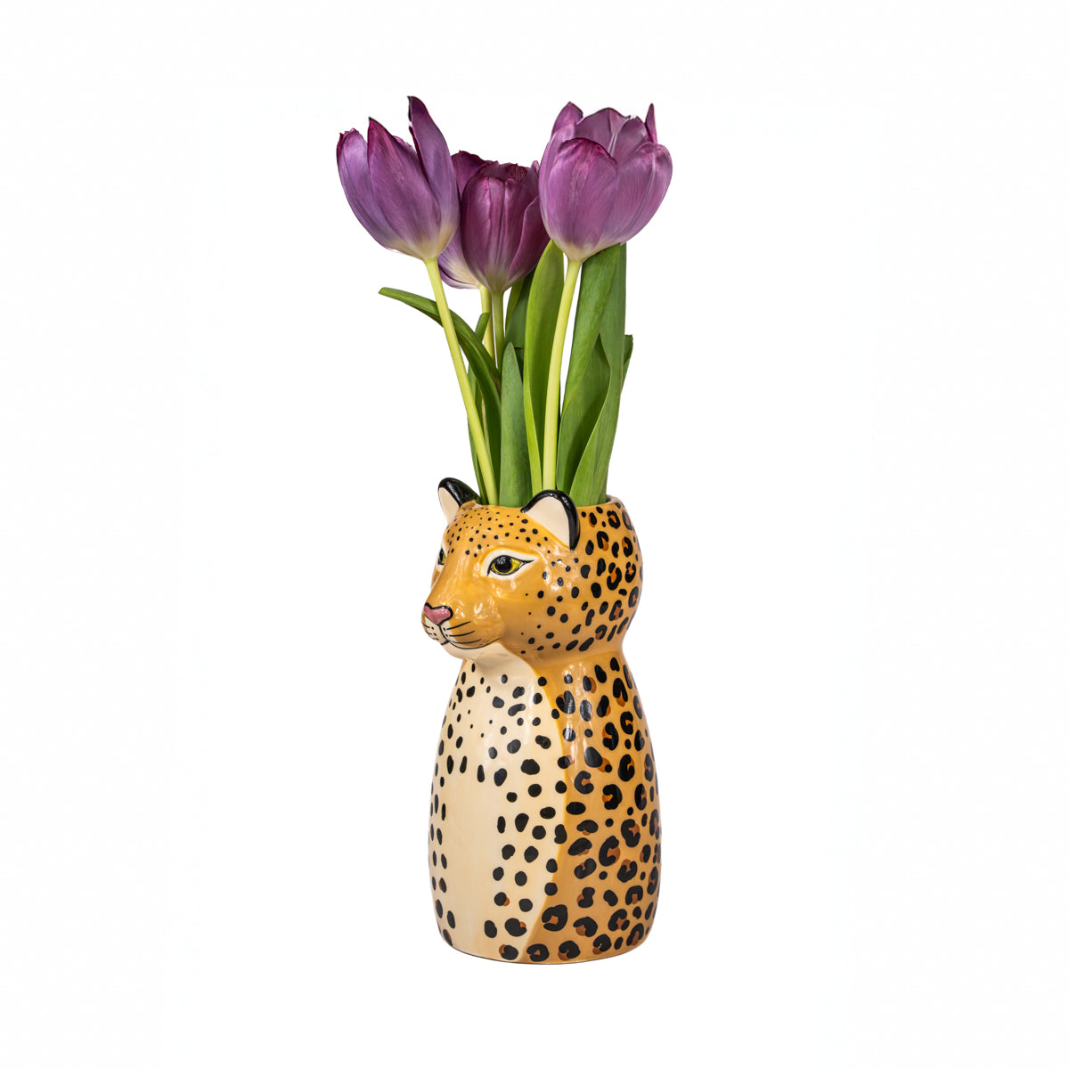 The Leopardo vase with a bunch of purple tulips rising from the animal's head.