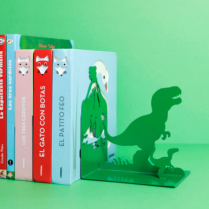 Same Jurassic bookend on a green background, holding children's books