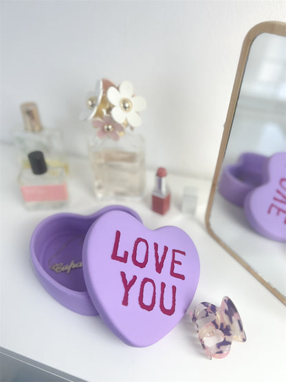 Love You heart box in lilac, open on a dressing table, shown from another angle.