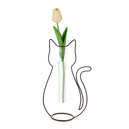 Wire vase shaped like a cat silhouette, with a tulip in the glass tube