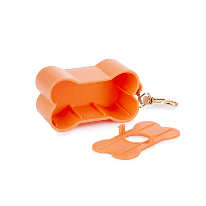 Biscuit dog waste bag holder, the peach box with the gold clip attached