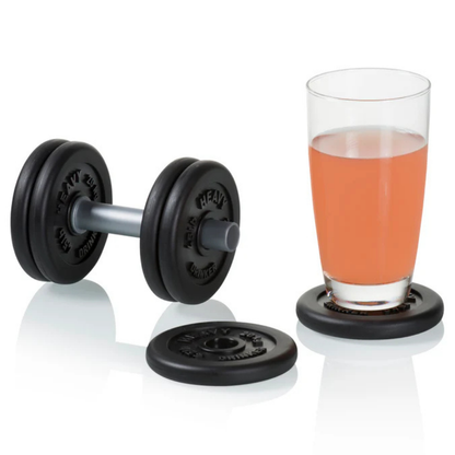 The dumbbell with a glass of orange juice resting on one of its discs as a coaster.