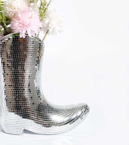 Santiago disco boot vase, mirrored, holding pink and white flowers, side view