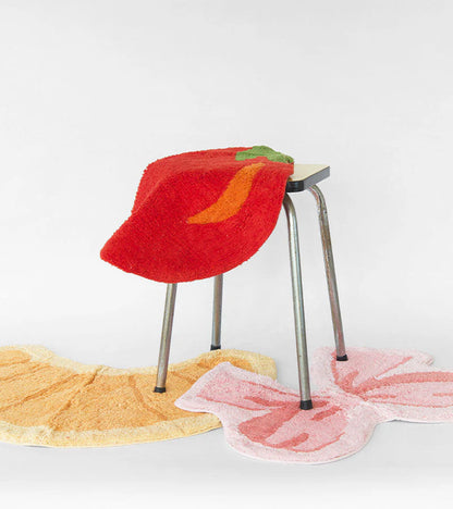 Croissant rug in honey tone on the floor in front of a vanity unit