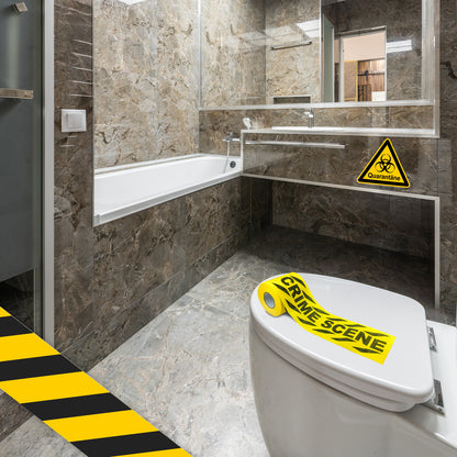 Crime Scene toilet paper yellow and black roll on a holder, in a bathroom with a hazard sign.