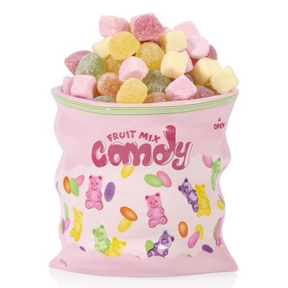 Candy vase shaped like a pink bag, filled with jelly sweets and marshmallows.