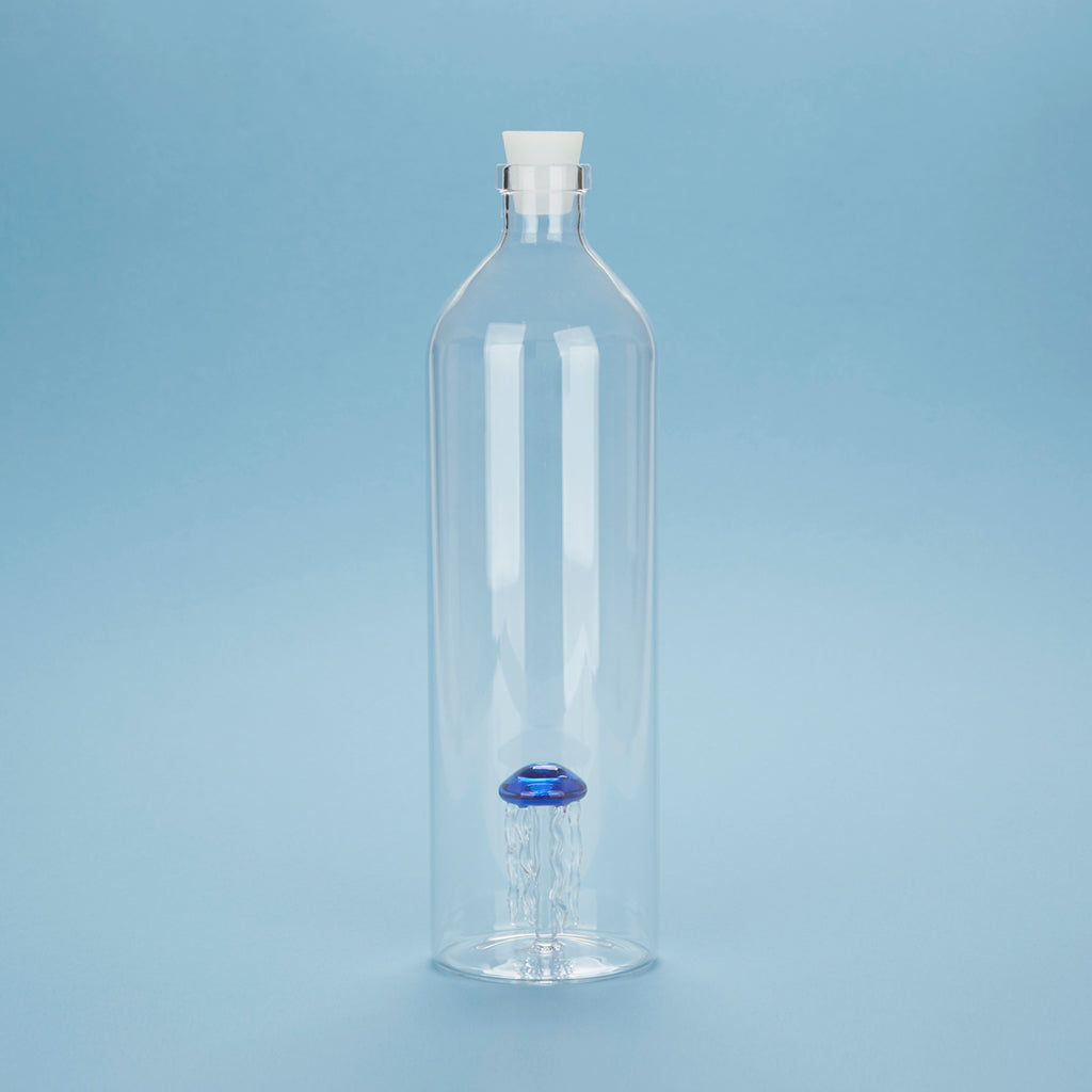 Same Atlantis Medusa bottle on a light blue background