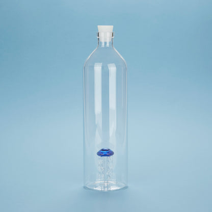 Same Atlantis Medusa bottle on a light blue background