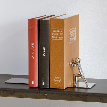 Push! bookend on a shelf, the figure pushing red, black and beige books