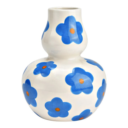 Daisy vase in white with a double-bulb shape, painted with blue daisies with orange centres, empty.