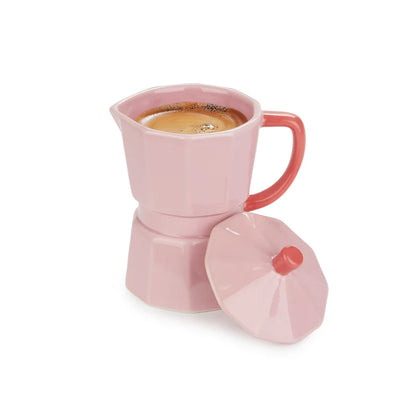Pink Moka Mug full of coffee, lid resting beside it