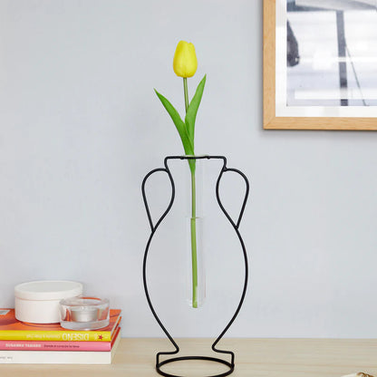 Hellas Silhouette vase on a shelf next to a picture frame, books and a candle