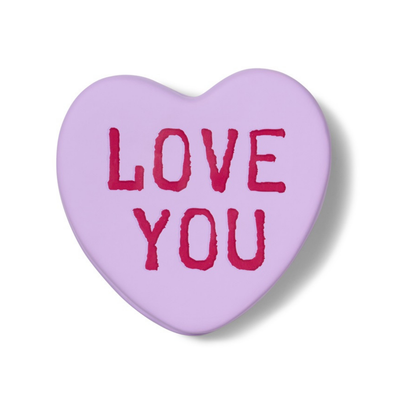 Love You heart-shaped box in lilac, closed, front view with the pink lettering.