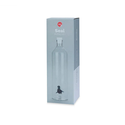 The seal bottle shown in its grey-blue box