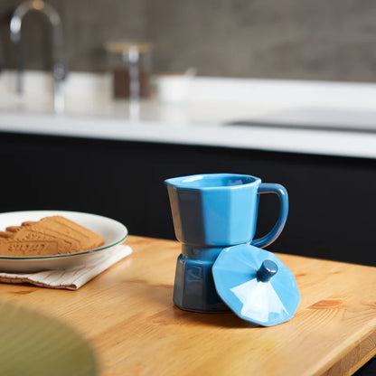 Blue Moka mug on a blue background with brown sugar cubes