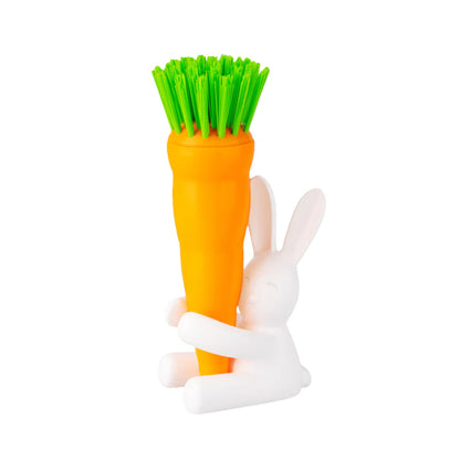 Bunny Dish Brush: an orange carrot-shaped brush held by a white rabbit