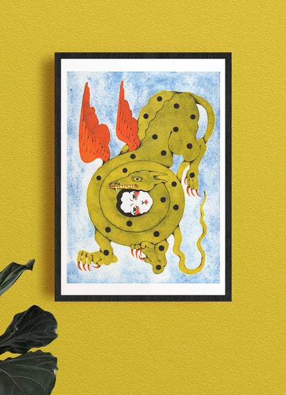 The Kiss poster framed on a yellow wall, a green winged creature with a face at its centre